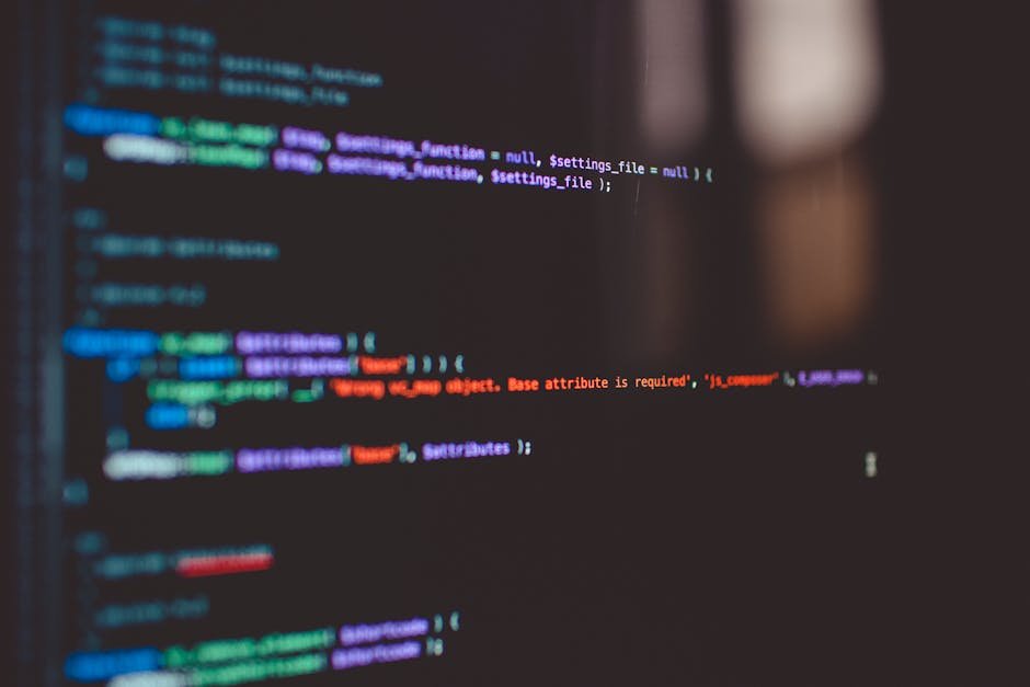 Código colorido de programação exibido em tela de computador